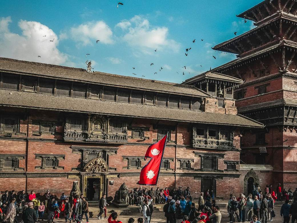 A public square in Kathmandu, with the flag of Nepal flying